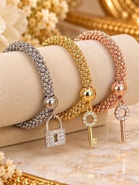 Three-Tone Lock & Key Charm Bracelet Set